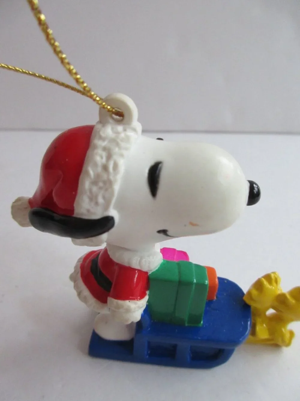 Peanuts PVC Snoopy Santa On Sleigh with Gifts, Woodstock Reindeer 2.5” Ornament